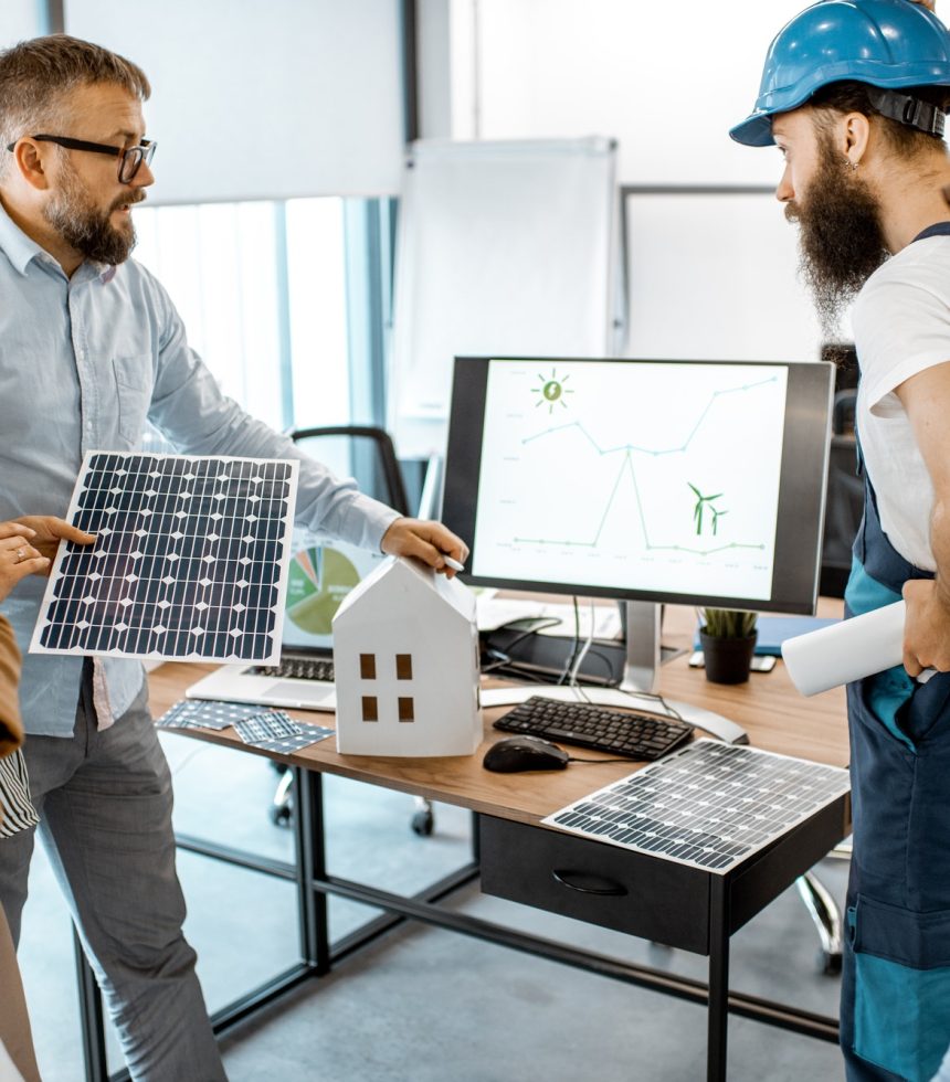 people-working-on-alternative-energy-project-in-the-office.jpg